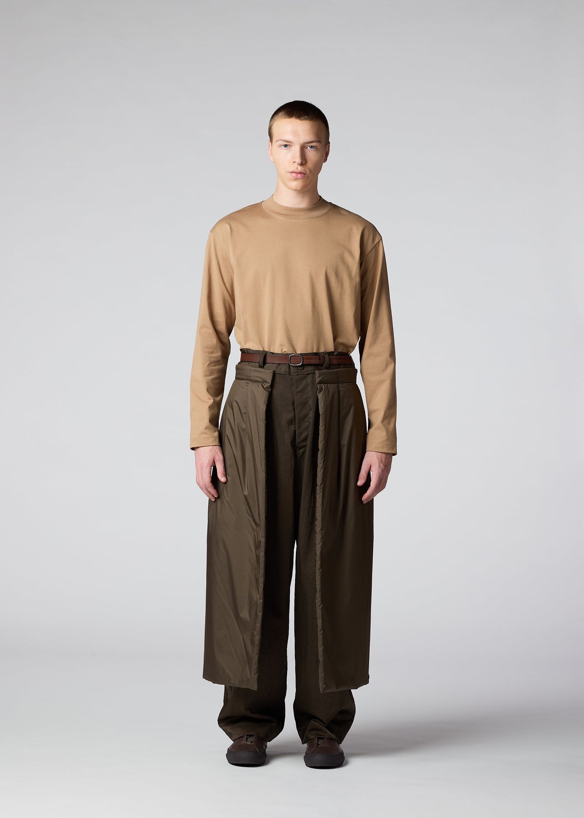 A model wears the IM Men SWITCH trousers.