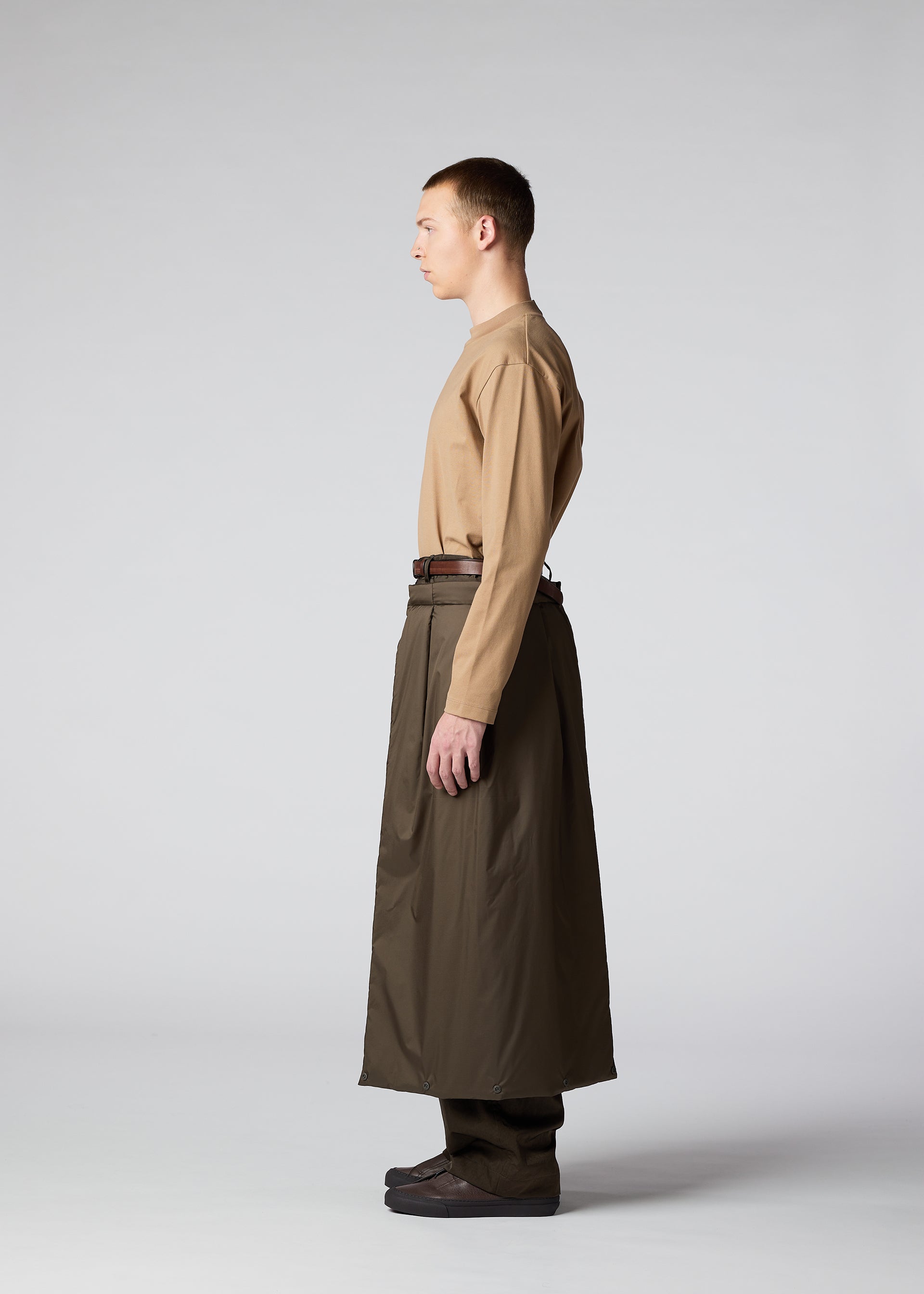 A model wears the IM Men SWITCH trousers.