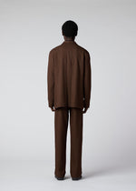A model wears the IM Men WOOL LIKE TWEED trousers.