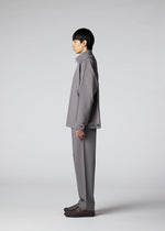 A model wears the IM Men FLAT trousers.