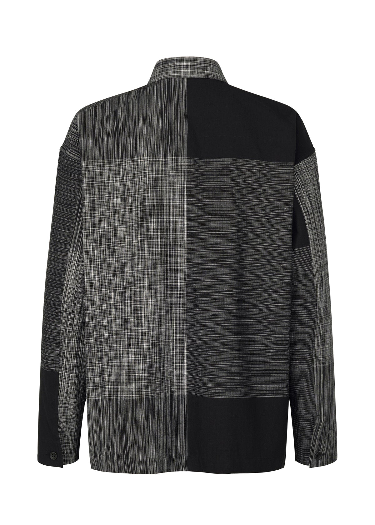 A detail shot of the IM MEN KASURI shirt.