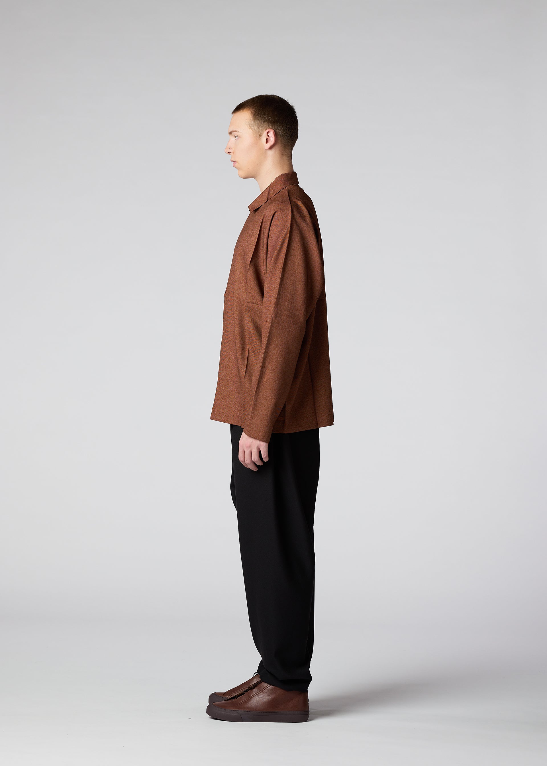 A model wears the IM Men WOOL LIKE COMPACT SHIRT shirt.