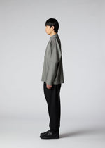 A model wears the IM Men WOOL LIKE COMPACT SHIRT shirt.