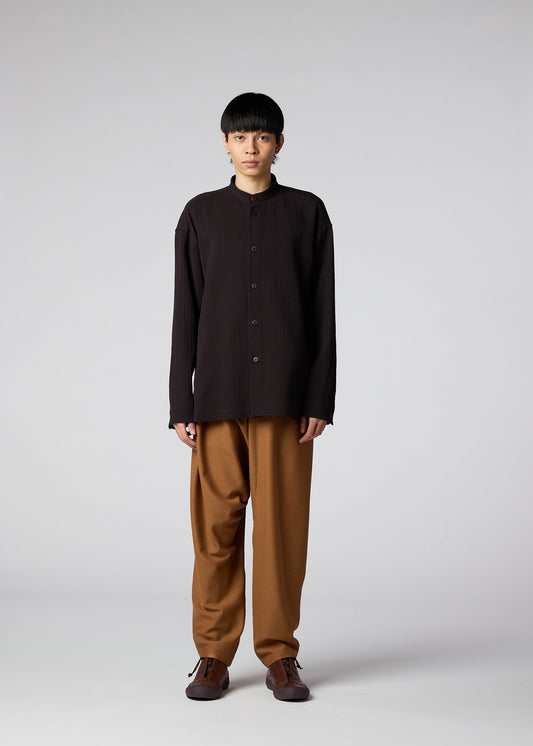 A model wears the IM Men DOUBLE WEAVE CREPE shirt.