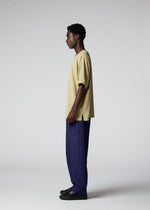 A model wears the IM MEN CREPE T top.