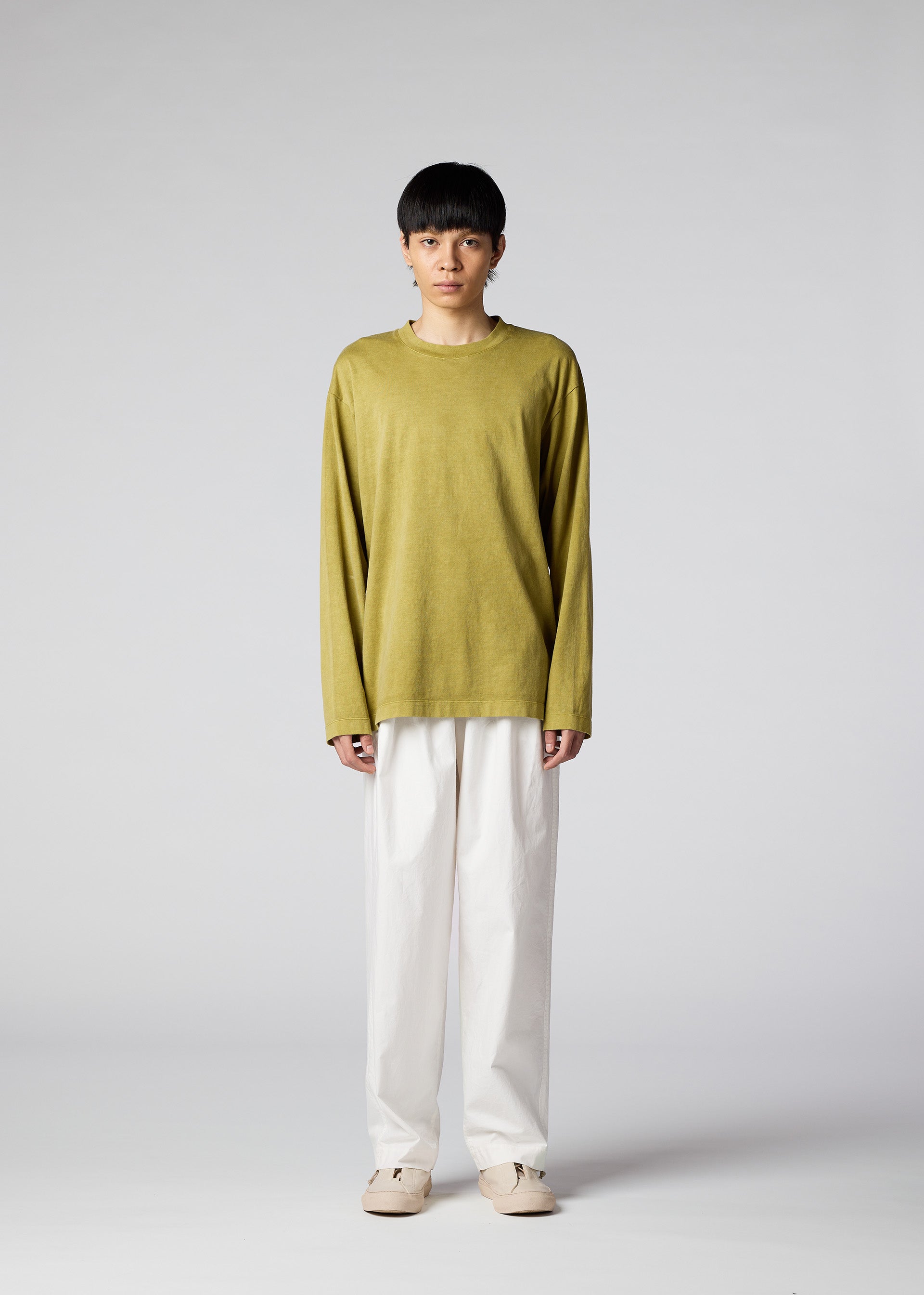 A model wears the IM Men PIGMENT T top.