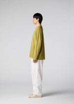 A model wears the IM Men PIGMENT T top.