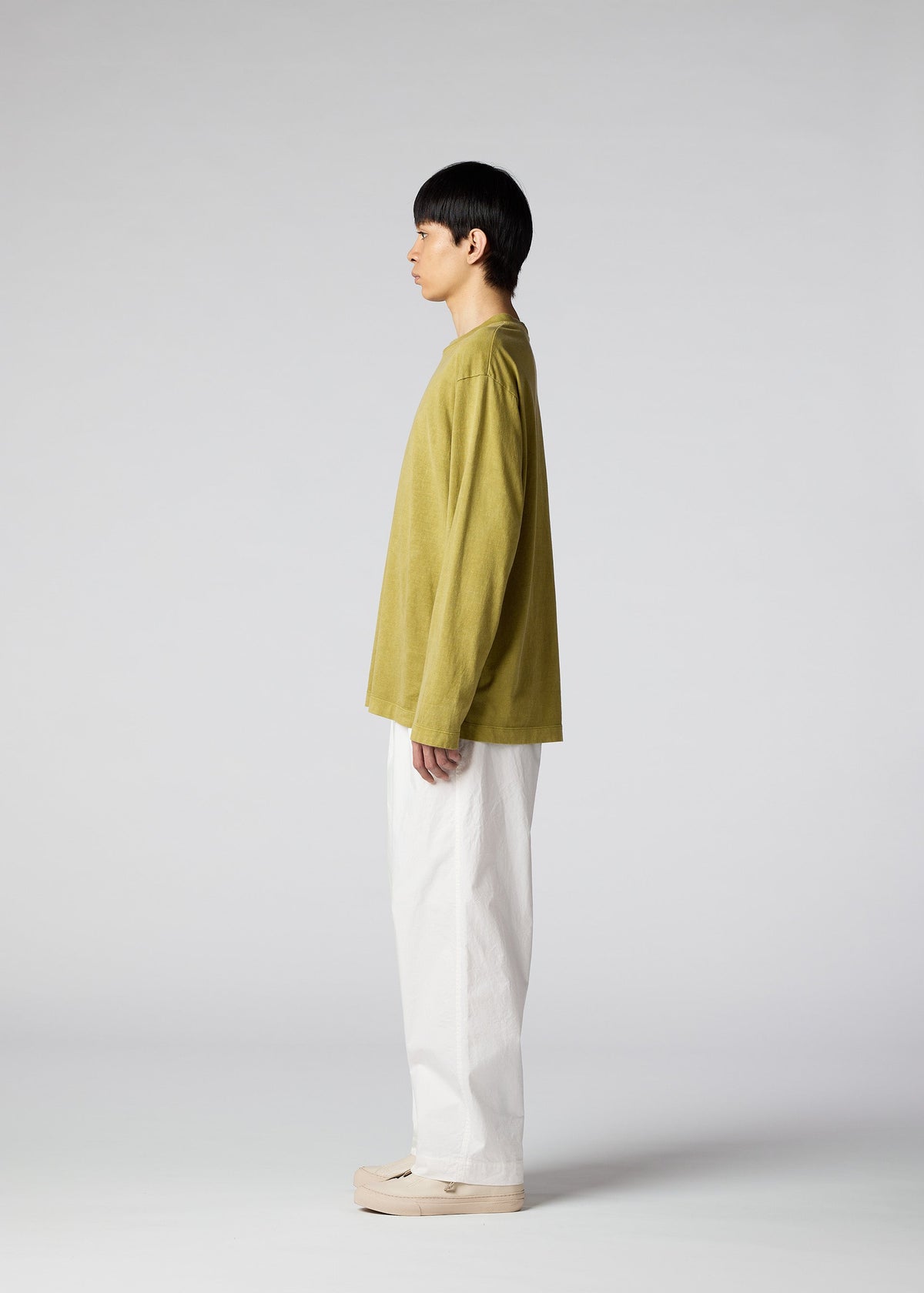 A model wears the IM Men PIGMENT T top.