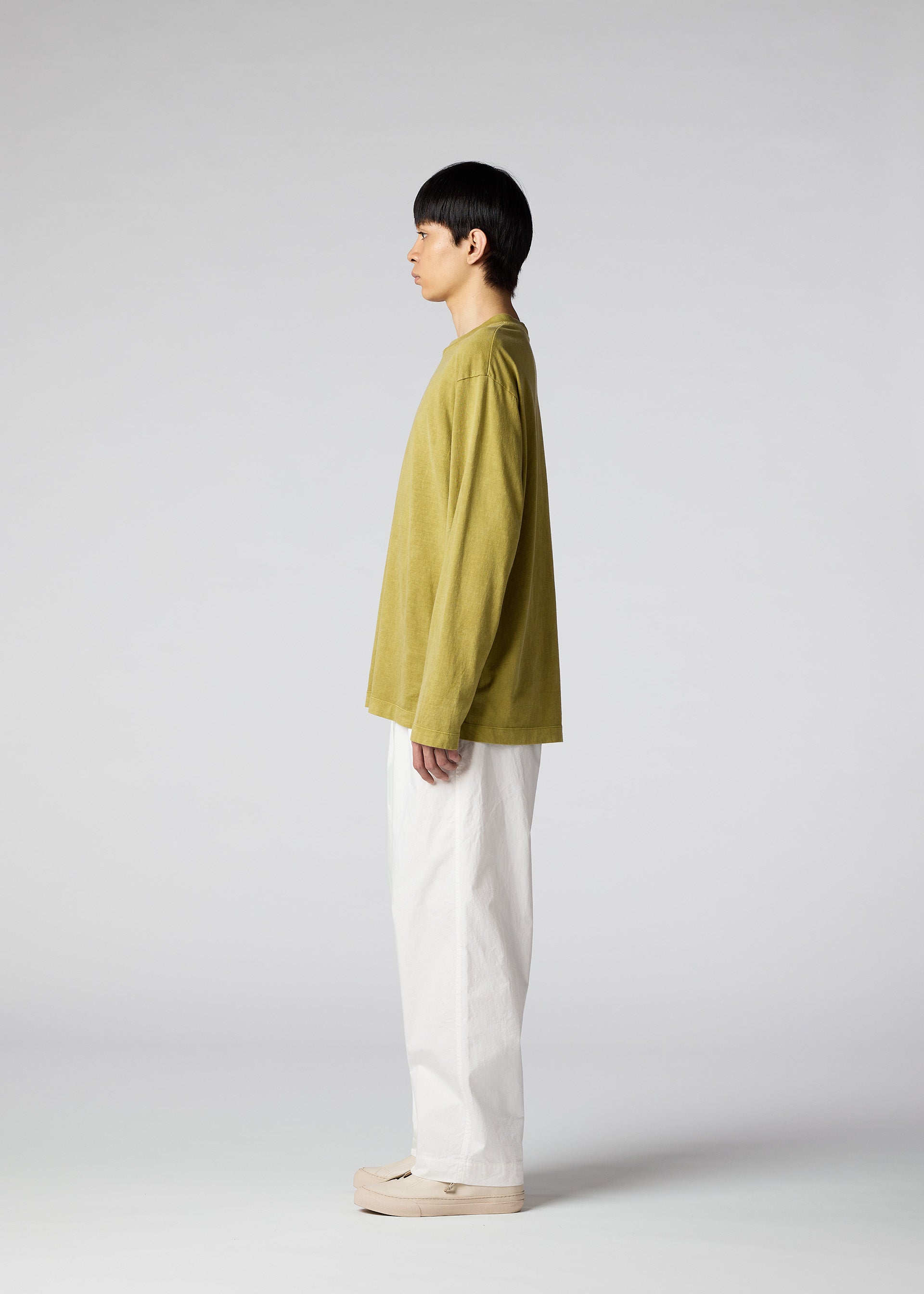 A model wears the IM Men PIGMENT T top.