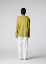 A model wears the IM Men PIGMENT T top.