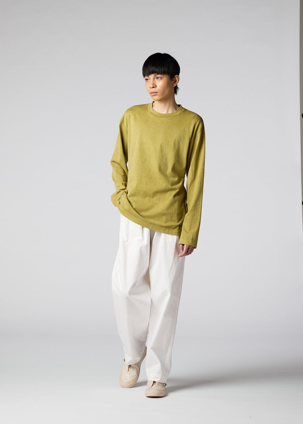 A model wears the IM Men PIGMENT T top.