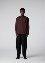 A model wears the IM Men 402 JERSEY STITCH top.