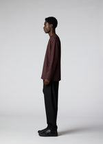 A model wears the IM Men 402 JERSEY STITCH top.