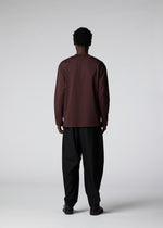 A model wears the IM Men 402 JERSEY STITCH top.