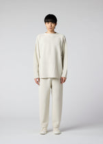 A model wears the IM Men SEAMLESS WASHI KNIT top.