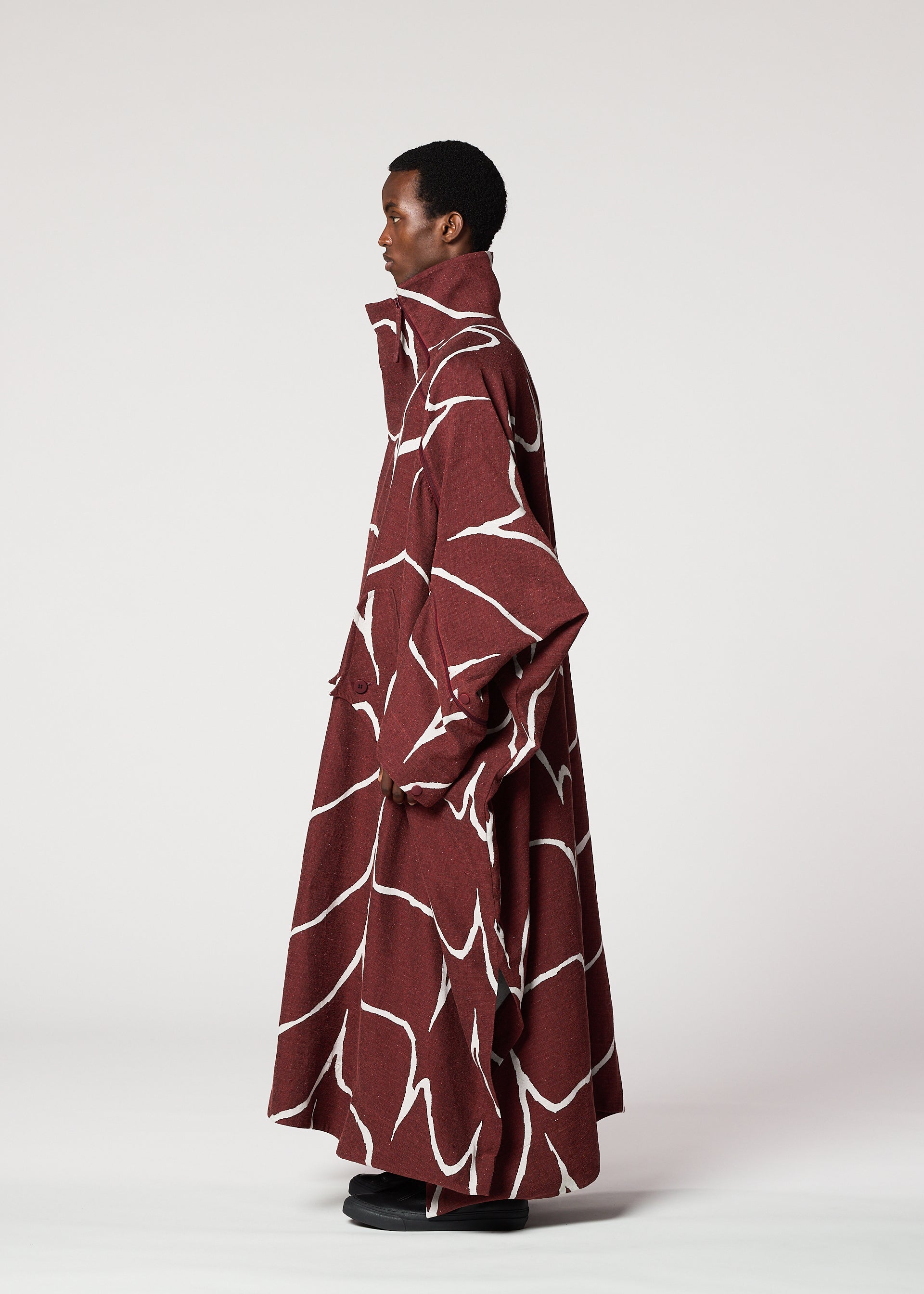 A model wears the IM MEN EARTH prêt à porter.