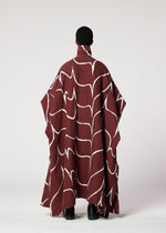 A model wears the IM MEN EARTH prêt à porter.