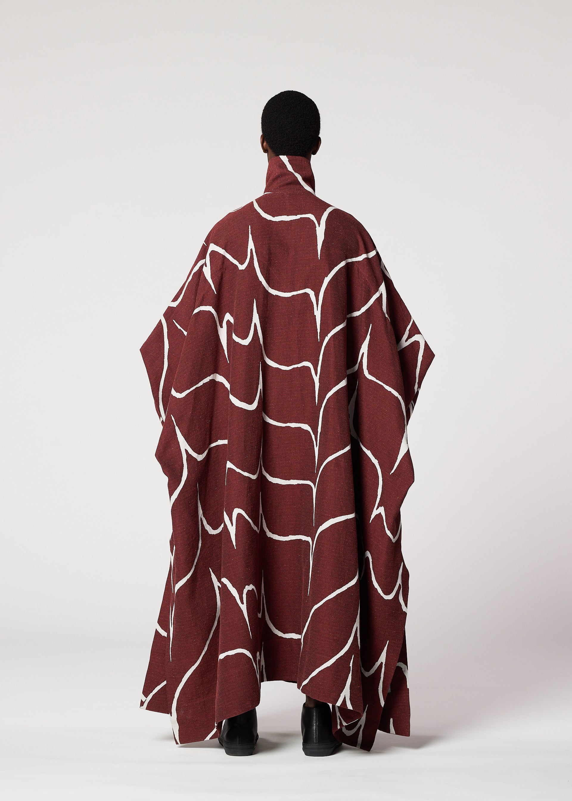 A model wears the IM MEN EARTH prêt à porter.