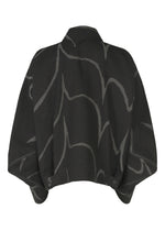 A detail shot of the IM MEN EARTH prêt à porter.