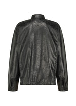 A detail shot of the IM MEN GINTO prêt à porter.