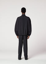 A model wears the IM Men AIR PLEATS prêt à porter.