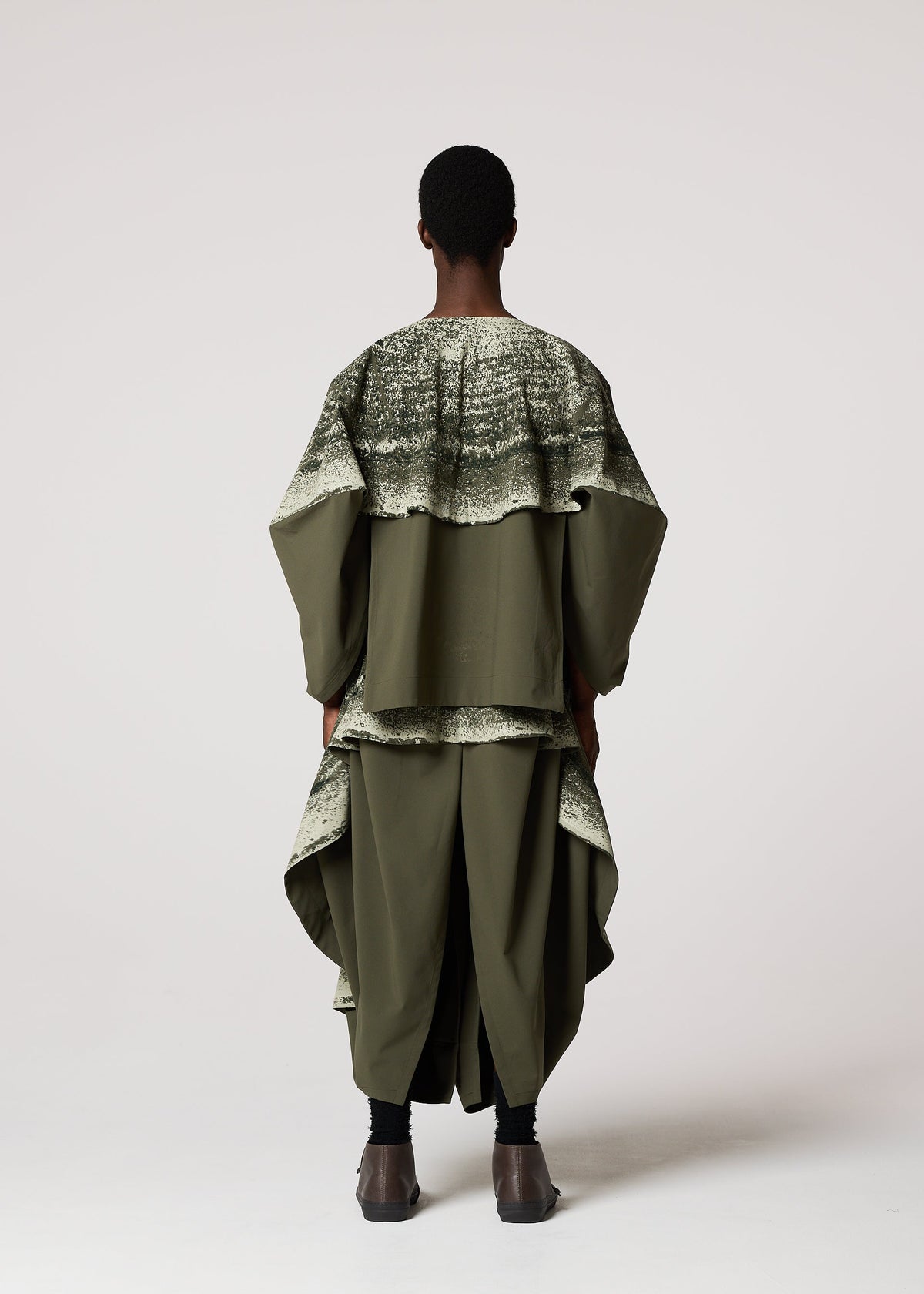 A model wears the IM Men KAIYU jacket.