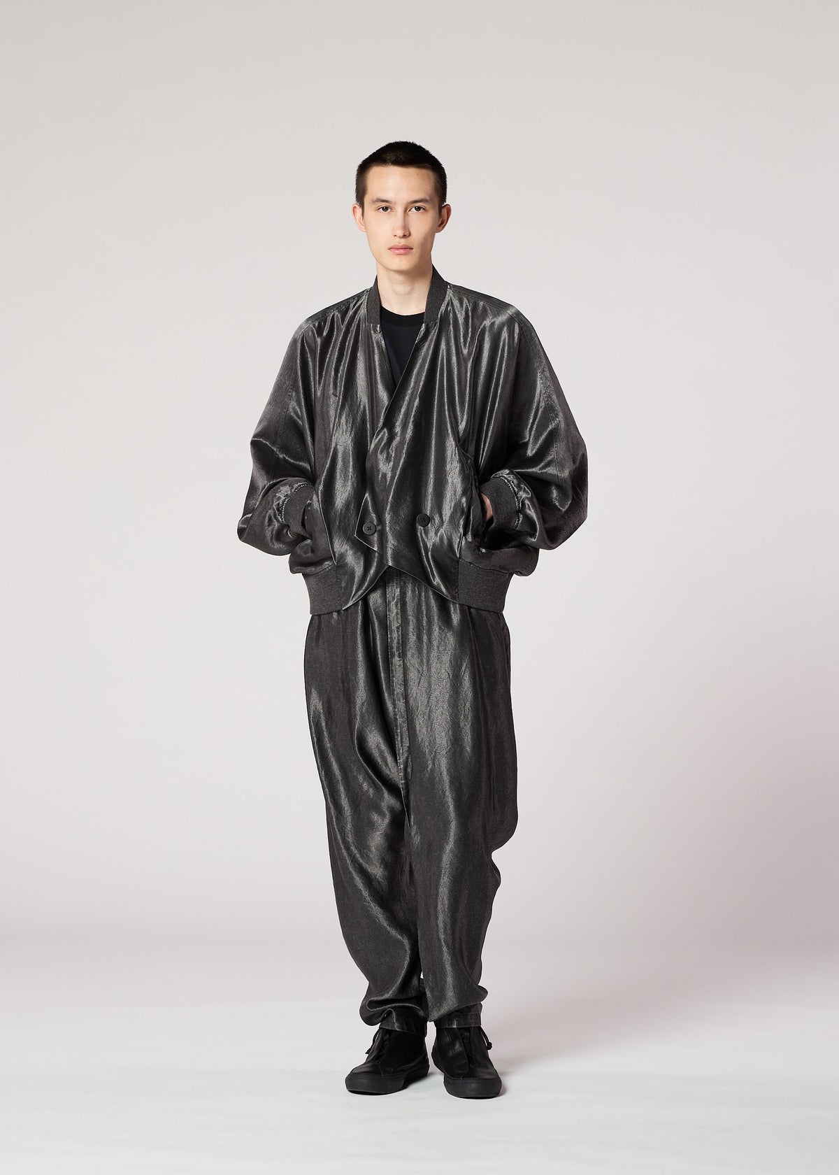 A model wears the IM Men SATIN WASH jacket.