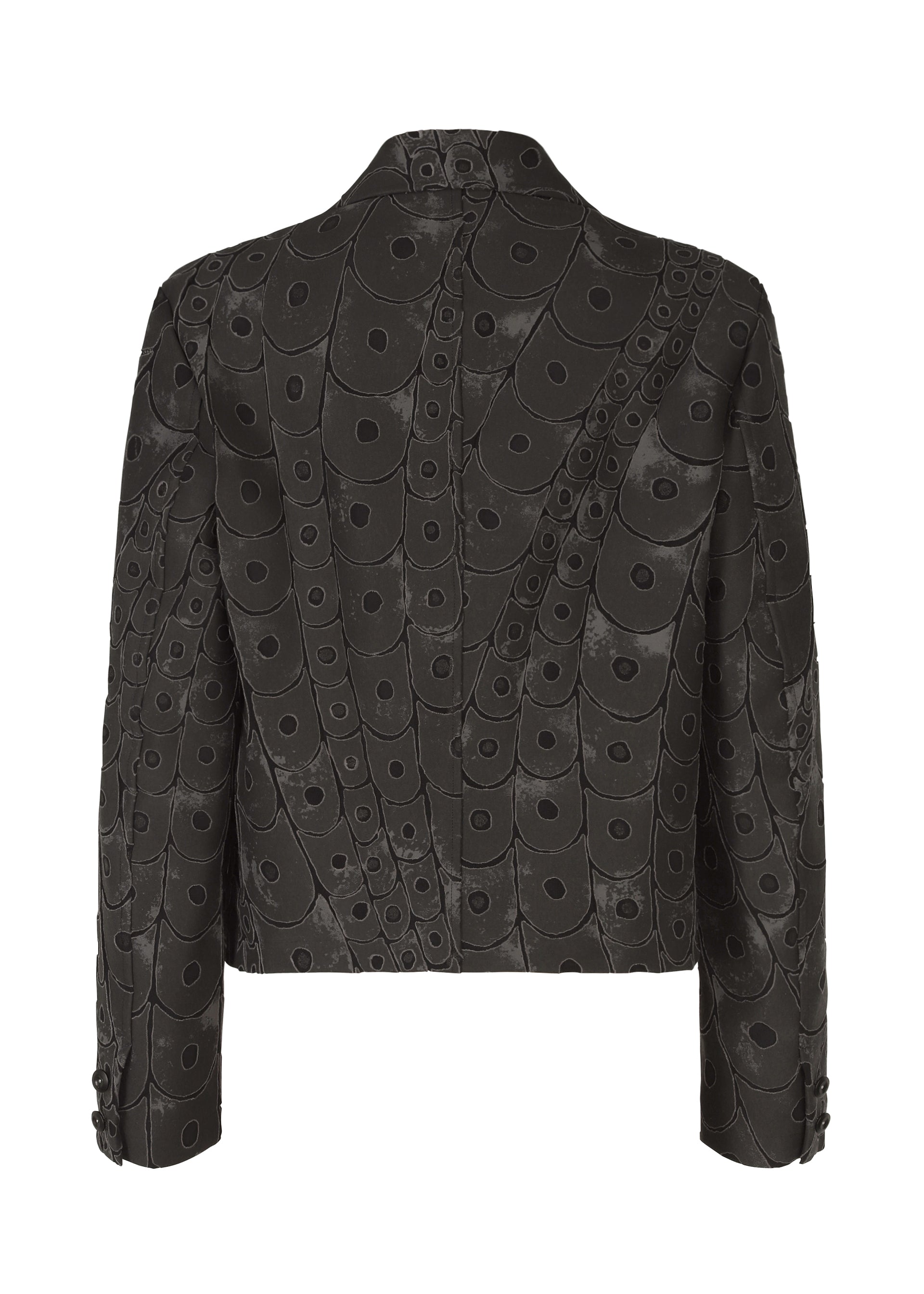 A detail shot of the IM Men UROKOMON prêt à porter.