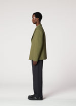 A model wears the IM Men CORNICE jacket.