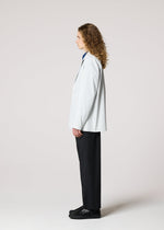 A model wears the IM Men AIR PLEATS prêt à porter.