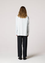 A model wears the IM Men AIR PLEATS prêt à porter.