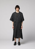 A model wears the IM Men UROKOMON prêt à porter.