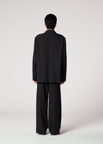 A model wears the IM MEN WINGS BLACK prêt à porter.