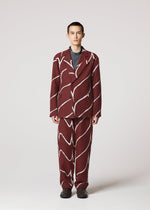 A model wears the IM MEN EARTH prêt à porter.