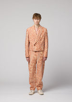 A model wears the IM Men UROKOMON prêt à porter.