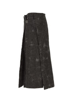 A detail shot of the IM Men UROKOMON prêt à porter.