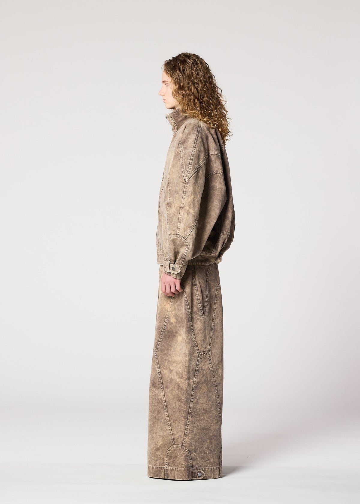 A model wears the IM Men ELEMENTS pants.