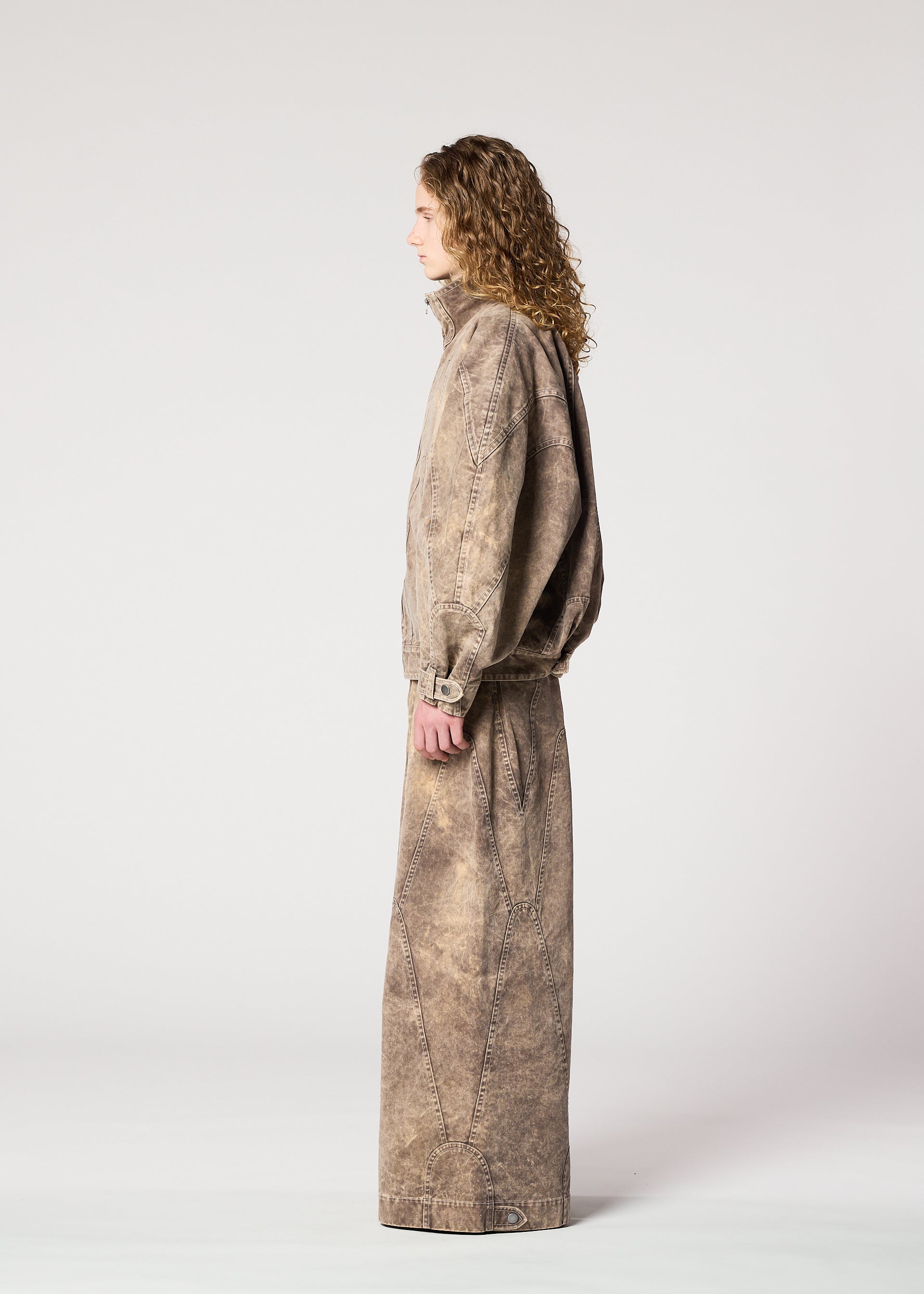 A model wears the IM Men ELEMENTS pants.