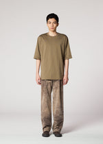 A model wears the IM Men ELEMENTS pants.