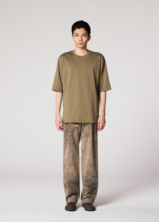 A model wears the IM Men ELEMENTS pants.