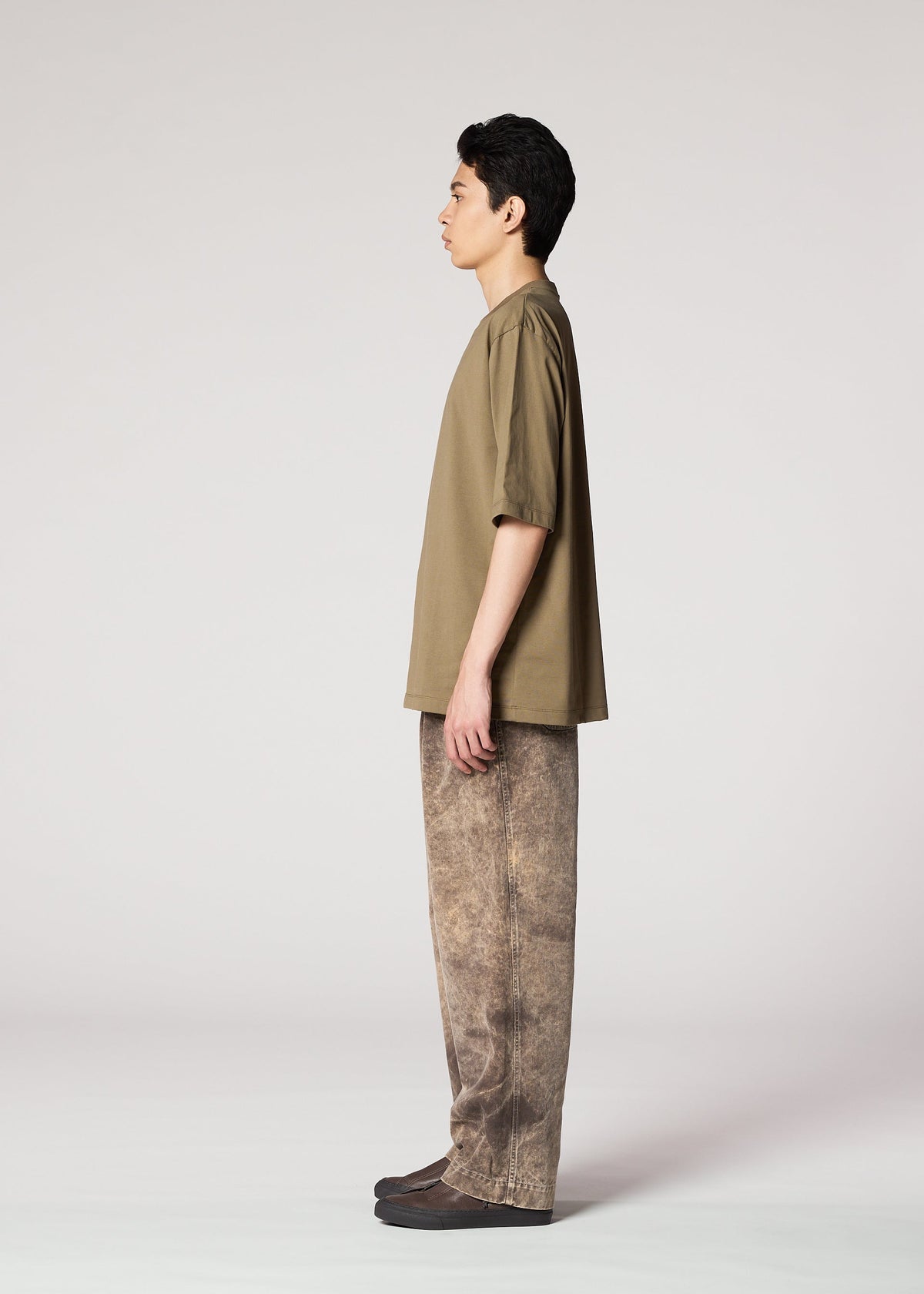 A model wears the IM Men ELEMENTS pants.