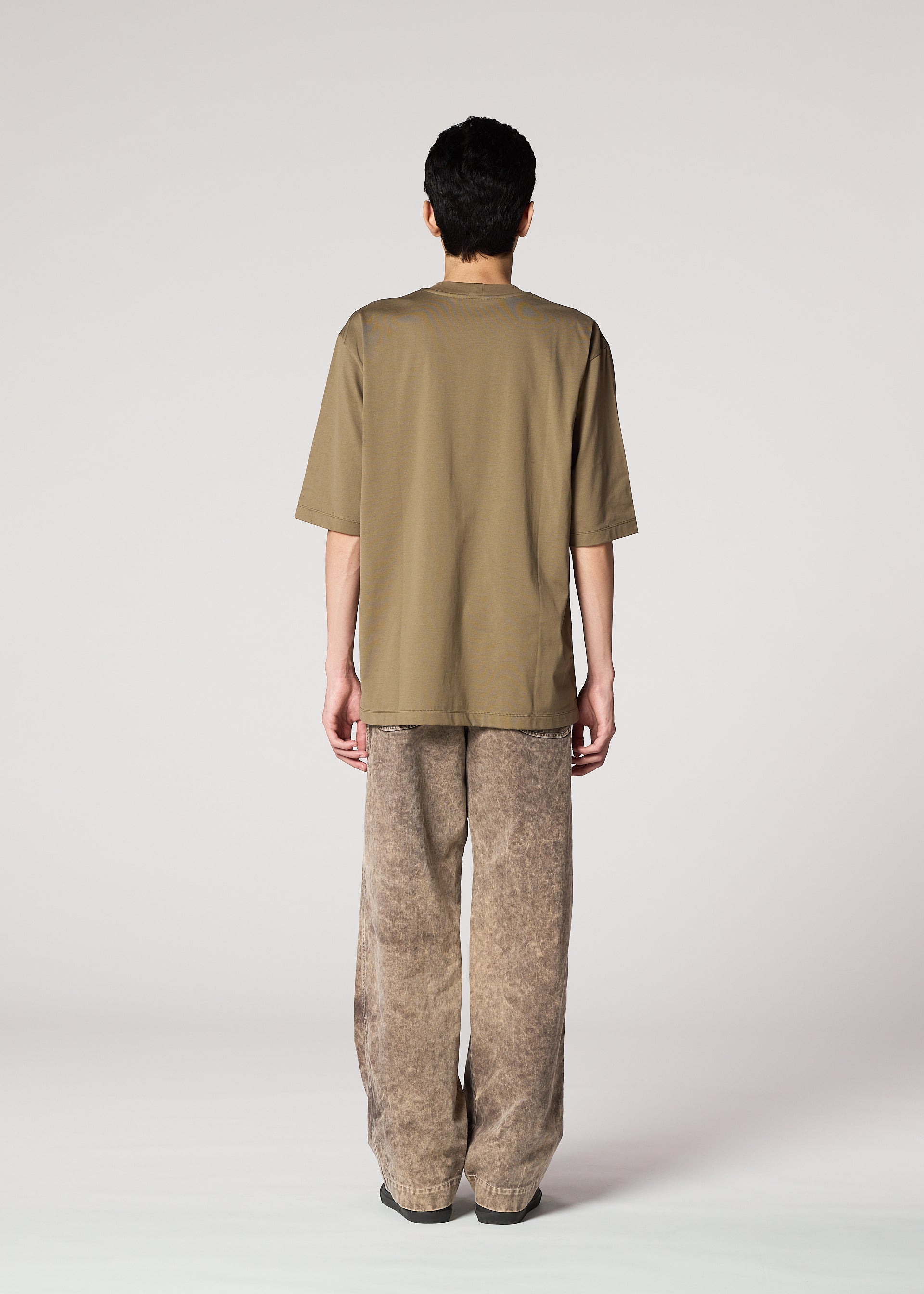 A model wears the IM Men ELEMENTS pants.