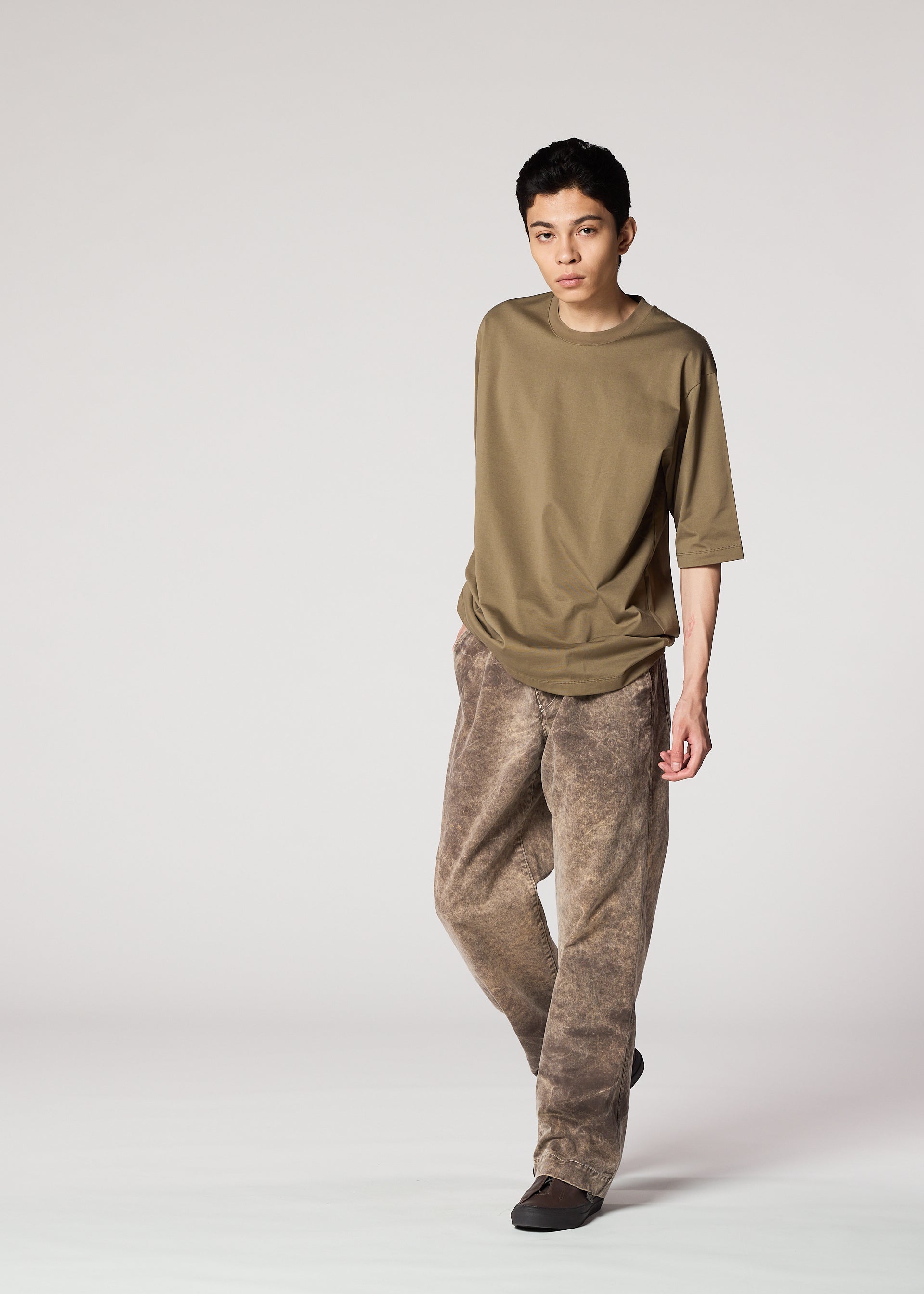 A model wears the IM Men ELEMENTS pants.