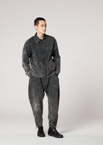A model wears the IM Men ELEMENTS pants.