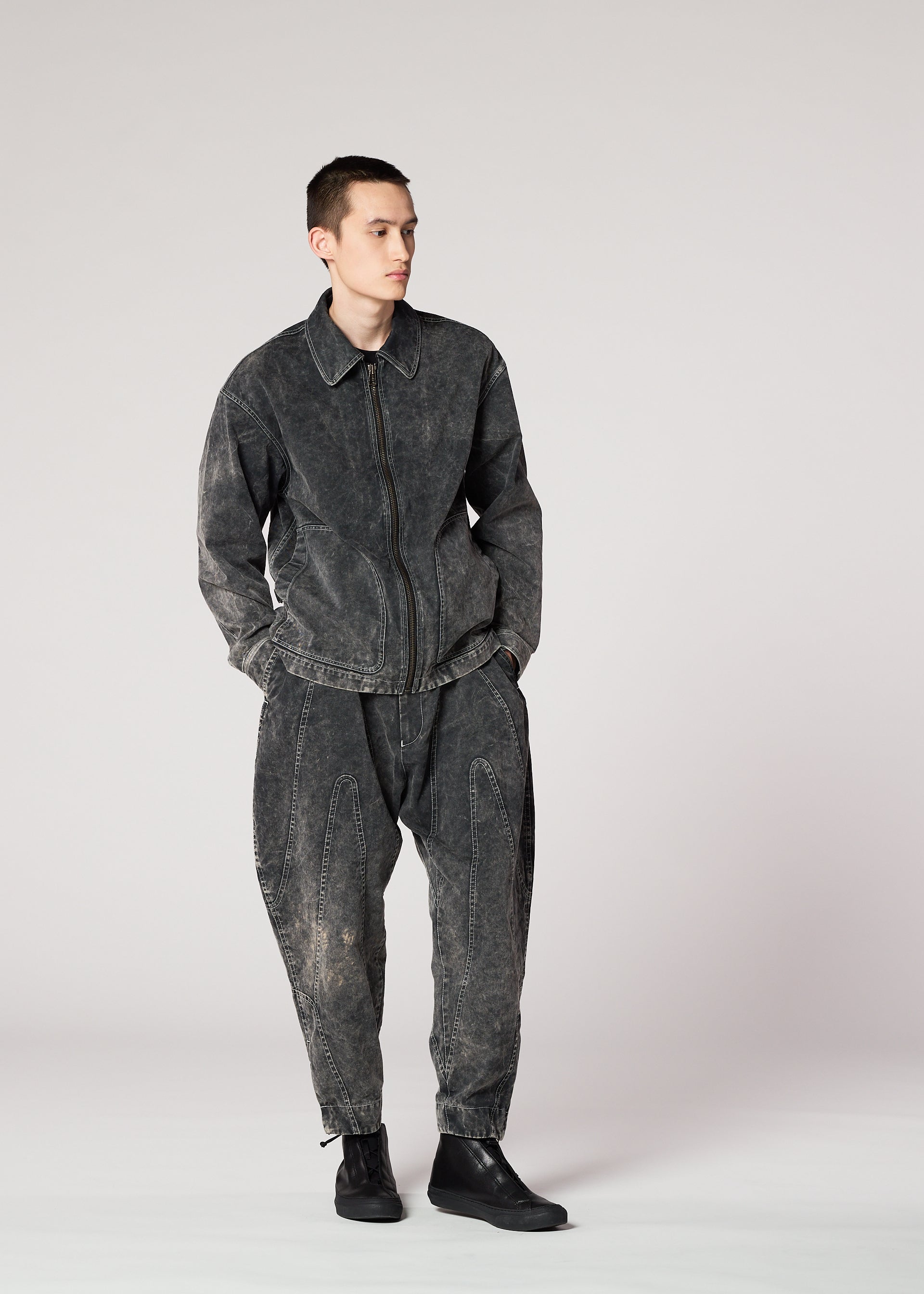 A model wears the IM Men ELEMENTS pants.