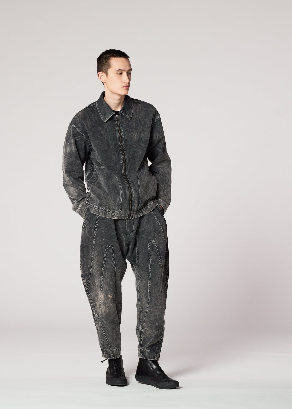 A model wears the IM Men ELEMENTS pants.