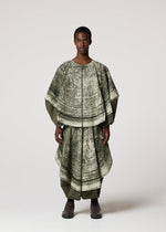 A model wears the IM Men KAIYU trousers.