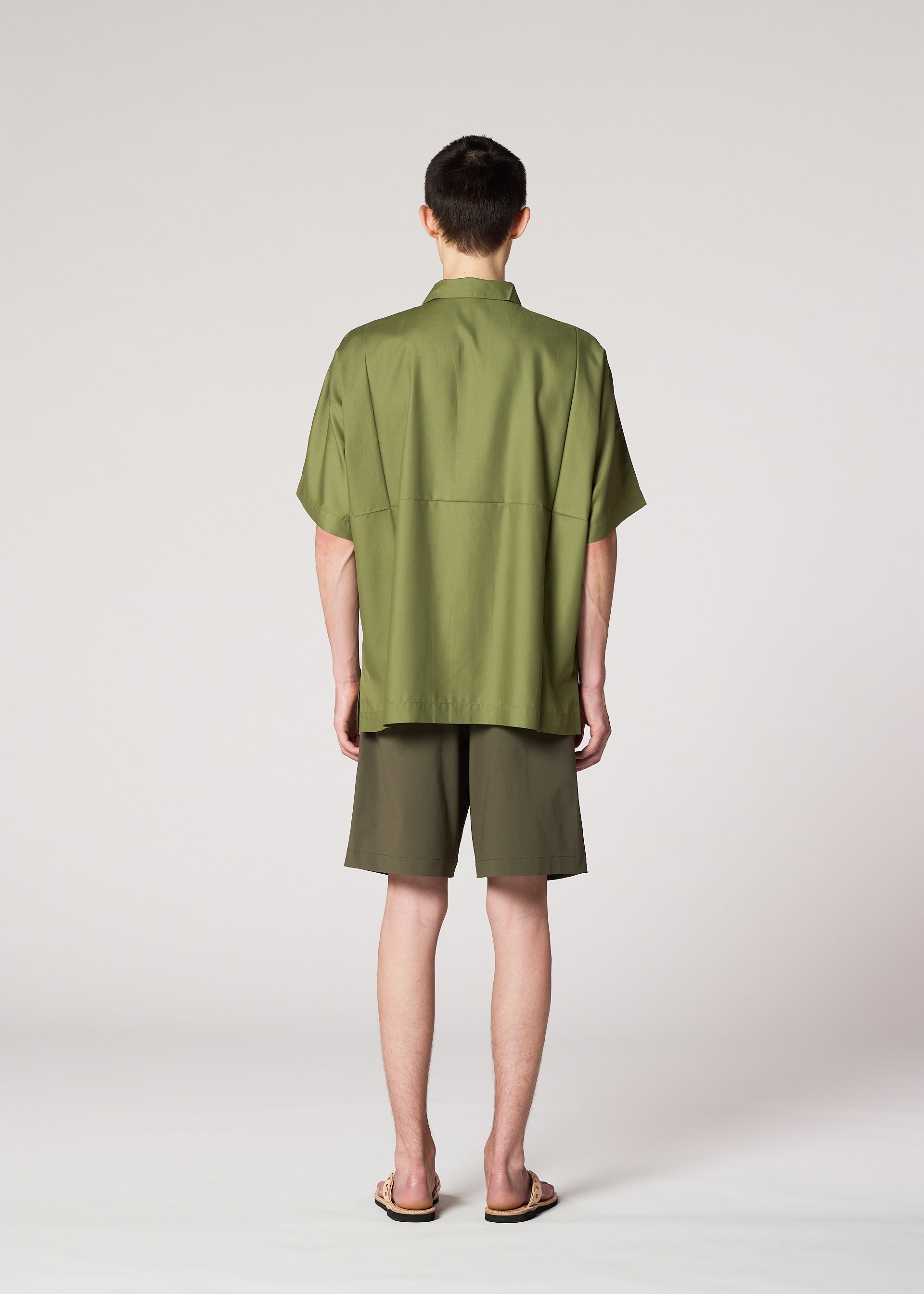 A model wears the IM Men KAIYU trousers.