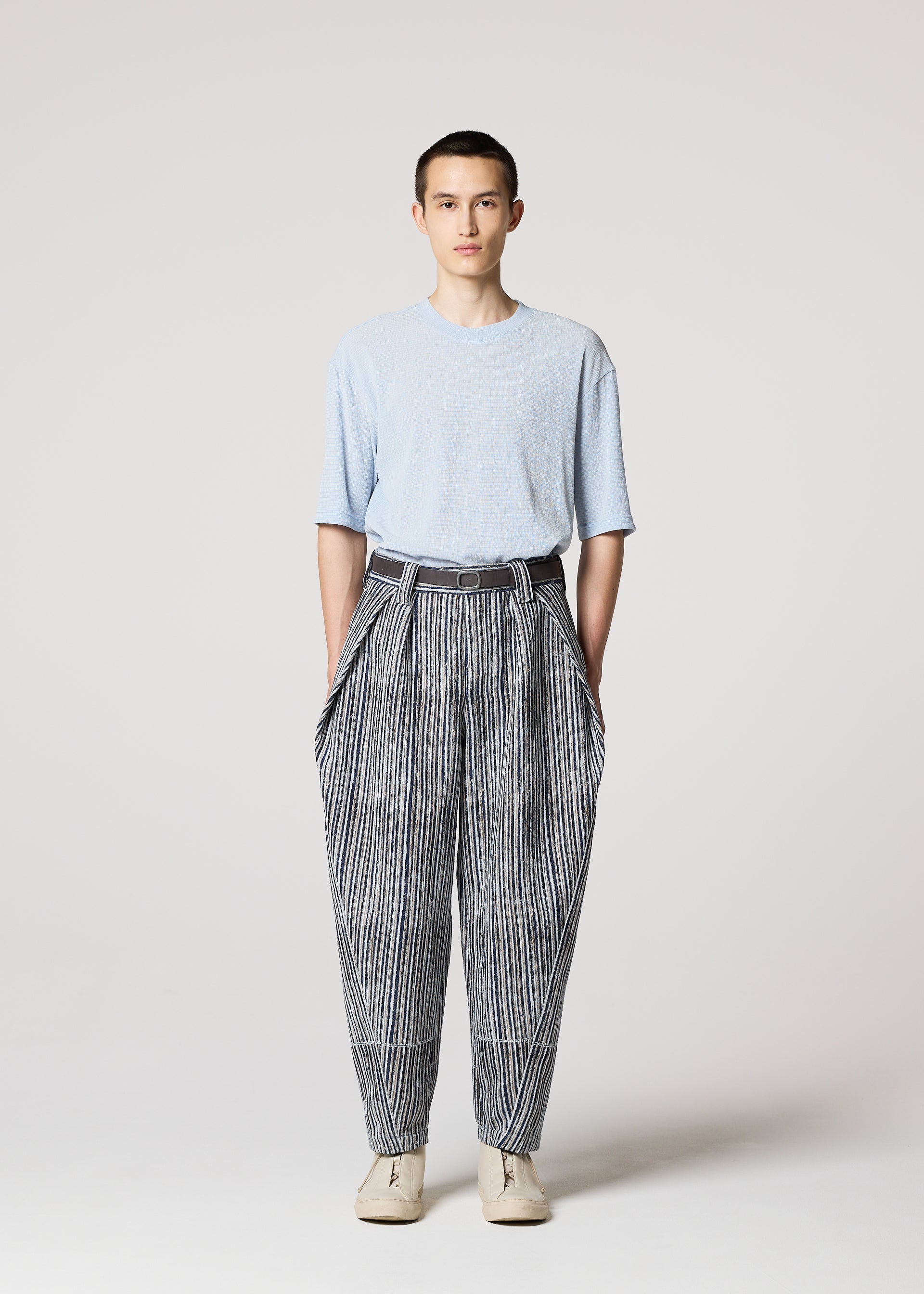 A model wears the IM MEN CURVINESS curviness-trousers-charcoal.
