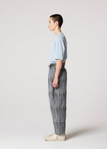 A model wears the IM MEN CURVINESS curviness-trousers-charcoal.